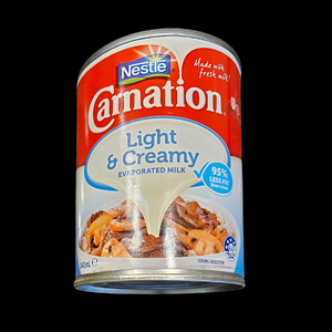 Milk Evaporated Carnation Light & Creamy 340ml 1/Ea - $3.90